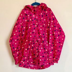 Girl’s dotty rain jacket